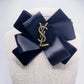 SIGNATURE BLACK VELVET AND SATIN SWIRL BROOCH - YSL