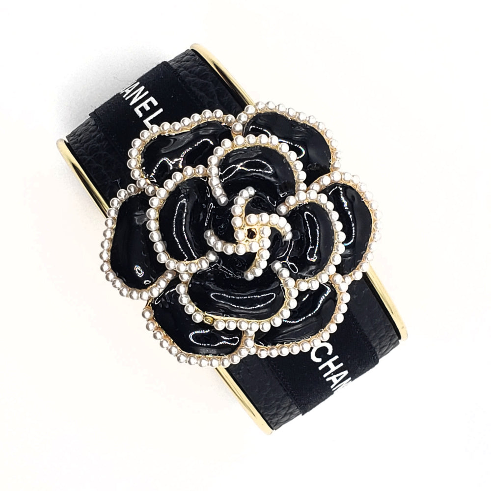 CHANEL BLACK CAMELLIA FLOWER RIBBON CUFF BRACELET